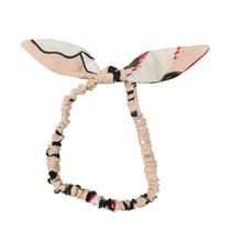 Tiara em tecido estampa floral bebê e moda infantil Tiara em tecido estampa floral bebê e moda infantil