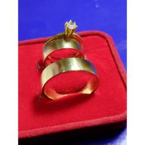 Trio de moedas Antigas Alianças e anel solitário Trio de moedas Antigas Alianças e anel solitário