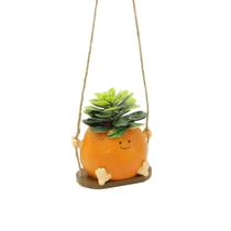 Vaso de plantas de resina de desenho animado Creative Orange Swing