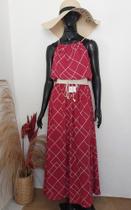 Vestido Charmy em poliéster e elastano. Forro e ajuste nas costas Vestido Charmy em poliéster e elastano. Forro e ajuste nas costas