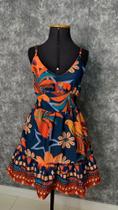 Vestido curto estampado alcinha