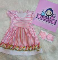 Vestido de bebê rosa da abrange