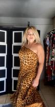 Vestido longo no tecido malha estampado de onça, modelo mula manca, veste tamanho único 42 ao 46. Vestido longo no tecido malha estampado de onça, modelo mula manca, veste tamanho único 42 ao 46.