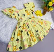 vestido modelo com manguinha e laço amarelo