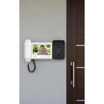 Vídeoporteiro Branco/Preto: Segurança e Conveniência 7" Full Vídeoporteiro Branco/Preto: Segurança e Conveniência 7" Full