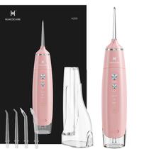 Water Flosser HUACO CARE equipado com dois tanques de água rosa