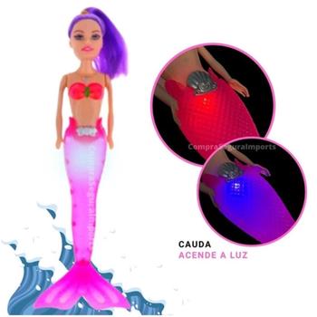 Imagem de Princesa Sereia Articulada com calda que pisca + Bebê Sereia The Mini Mermaids + Pente Acessório