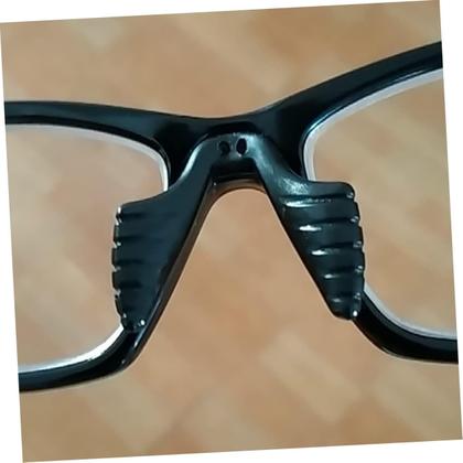 Imagem de 01 Plaqueta Ponte Anatômica Moldável Silicone P/Óculos Acetato conserto armação oculos grau solar adaptação parafusar peça apoio nasal nariz macia