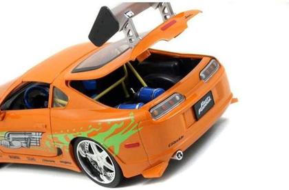 1/18 1995 toyota supra laranja brian velozes e furiosos com boneco