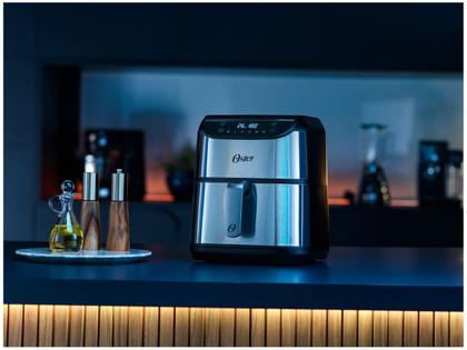 Air Fryer Oster OFRT930 Inox e Preto com Timer Inox 5L Imagem de Air Fryer Oster OFRT930 Inox e Preto com Timer Inox 5L