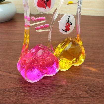 Imagem de Ampulheta de óleo liquido com temporizador coração duplo 