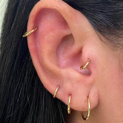 Imagem de Argola clicker segmentada em ouro 18k - unidade