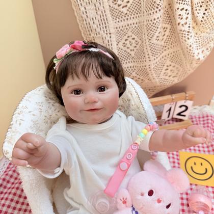 Imagem de Bebê Reborn Boneca Realista Brastoy Corpo Silicone Pode Dar Banho Roupa Chupeta Mamadeira e Pelúcia Acessórios Completos