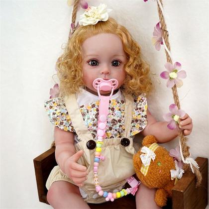 Imagem de Bebê Reborn Boneca Realista Brastoy Corpo Silicone Pode Dar Banho Roupa Chupeta Mamadeira e Pelúcia Acessórios Completos