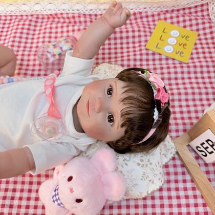 Imagem de Bebê Reborn Boneca Realista Brastoy Original Acessórios Completos Corpo Silicone Pode Dar Banho Roupa Chupeta Mamadeira e Pelúcia