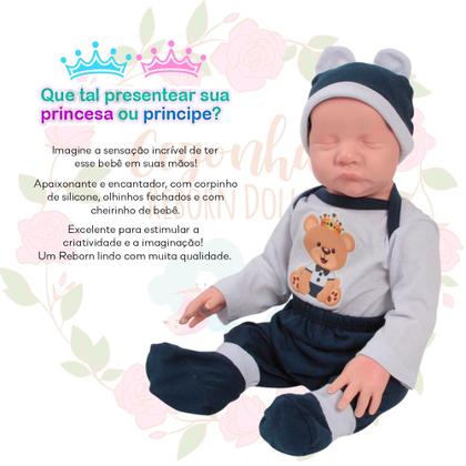 Imagem de Bebê Reborn com Roupinha Urso Realista Olhos Fechados