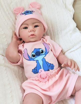 Imagem de Bebê Reborn Menina Realista Ana Dolls 50cm, Corpo Silicone Pode Tomar Banho, Carequinha Caneta Stitch Enxoval Completo de 13 Itens