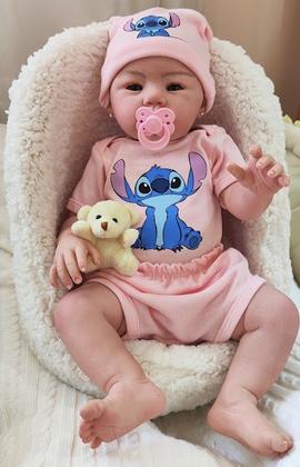 Imagem de Bebê Reborn Menina Realista Ana Dolls 50cm, Corpo Silicone Pode Tomar Banho, Carequinha Caneta Stitch Enxoval Completo de 13 Itens