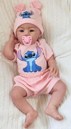 Imagem de Bebê Reborn Menina Realista Ana Dolls 50cm, Corpo Silicone Pode Tomar Banho, Carequinha Caneta Stitch Enxoval Completo de 13 Itens