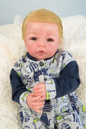 Imagem de Bebê reborn realista artesanal menino loiro corpo de tecido