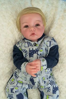 Imagem de Bebê reborn realista artesanal menino loiro corpo de tecido