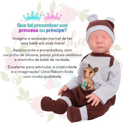 Imagem de Bebê Reborn Realista Corpo Silicone Dormindo Roupa Capivara