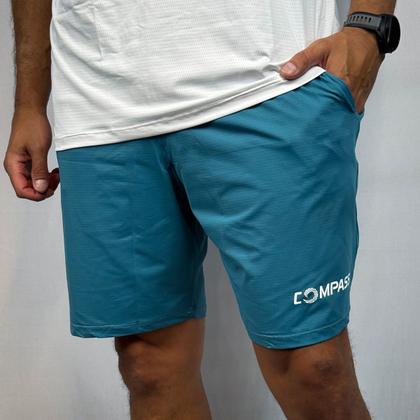 Imagem de Bermuda Esportiva Compass Dry Lisa Azul Turquesa Logo Branco Cor:AzulTamanho:P