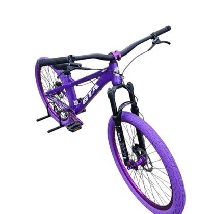 Imagem de Bicicleta 26 Gta Gravity Cor Roxo Freeride Hollowtech Single Cubo k7 Barulhento Freio a Disco Hidráulico Garfo C/Trava Pneu Flame Roxo