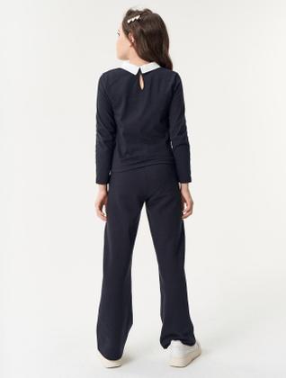 Imagem de Blusa Com Gola Preto Catavento