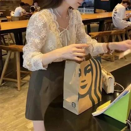 Imagem de Blusa Feminina Branca de Renda Damasco - Manga Comprida, Gola Bufante e Cadarço