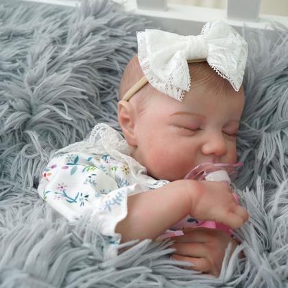 Imagem de Boneca Bebê Reborn Brastoy Realista Silicone 48cm Conjunto de Roupa Chupeta Mamadeira Fralda Certidão e Pelúcia Pode Dar Banho Roupa
