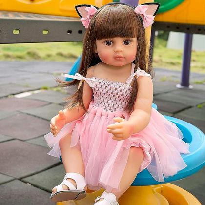 Imagem de Boneca Bebê Reborn Menina Gatinha Realista Brastoy 100% Silicone Pode Dar Banho Conjunto de Roupa Chupeta Mamadeira e Pelúcia