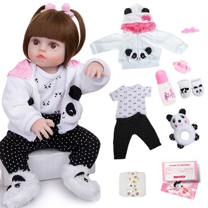 Imagem de Boneca Bebê Reborn Menina Pandinha Realista Brastoy 100% Silicone Pode Dar Banho Conjunto de Roupa Chupeta Mamadeira e Pelúcia