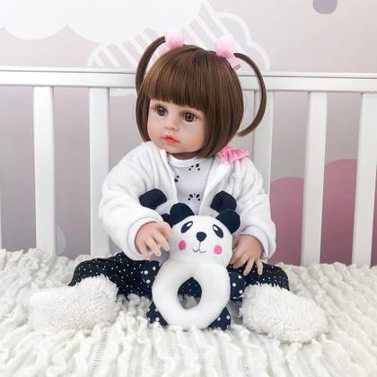 Imagem de Boneca Bebê Reborn Menina Pandinha Realista Brastoy 100% Silicone Pode Dar Banho Conjunto de Roupa Chupeta Mamadeira e Pelúcia