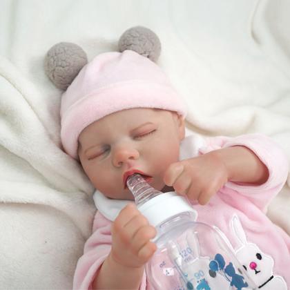 Imagem de Boneca Bebê Reborn Realista Brastoy 100% Silicone Pode Dar Banho Conjunto de Roupa Chupeta Mamadeira e Pelúcia