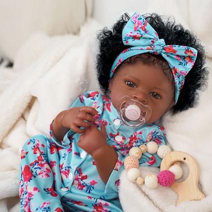 Imagem de Boneca Bebê Reborn Realista Brastoy 100% Silicone Pode Dar Banho Conjunto de Roupa Chupeta Mamadeira e Pelúcia