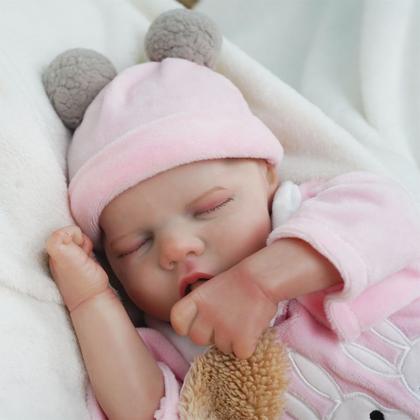 Imagem de Boneca Bebê Reborn Realista Brastoy 100% Silicone Pode Dar Banho Conjunto de Roupa Chupeta Mamadeira e Pelúcia