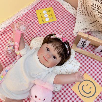 Imagem de Boneca Bebê Reborn Realista Brastoy Original 100% Silicone Pode Dar Banho Conjunto de Roupa Chupeta Mamadeira e Pelúcia