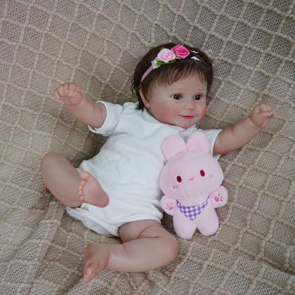 Imagem de Boneca Bebê Reborn Realista Brastoy Original 100% Silicone Pode Dar Banho Conjunto de Roupa Chupeta Mamadeira e Pelúcia