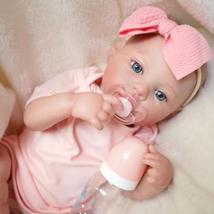Imagem de Boneca Bebê Reborn Realista Brastoy Silicone Conjunto de Roupa Chupeta Mamadeira e Pelúcia
