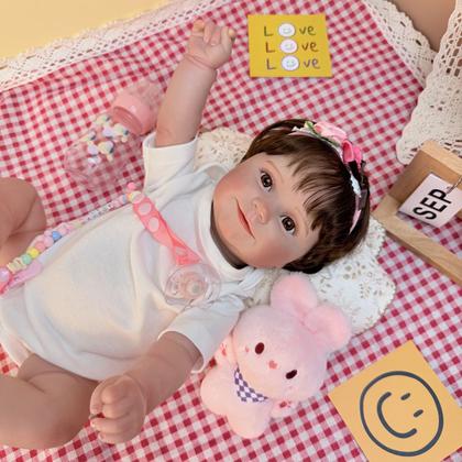 Imagem de Boneca Bebê Reborn Realista Brastoy Silicone Conjunto de Roupa Chupeta Mamadeira e Pelúcia