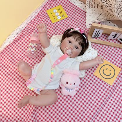 Imagem de Boneca Bebê Reborn Realista Brastoy Silicone Conjunto de Roupa Chupeta Mamadeira e Pelúcia