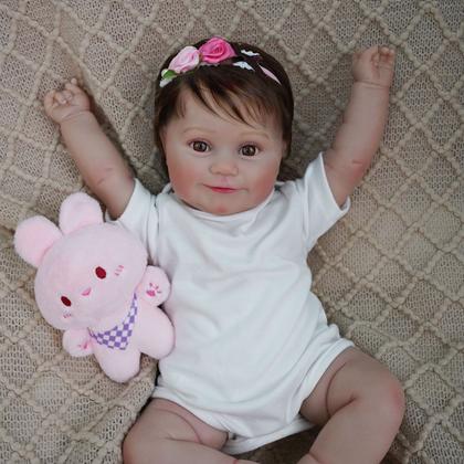 Imagem de Boneca Bebê Reborn Realista Brastoy Silicone Conjunto de Roupa Chupeta Mamadeira e Pelúcia