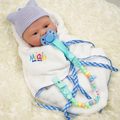 Imagem de Boneco Bebê Reborn Brastoy Silicone Sólido 40cm Pode Tomar Banho Kit Acessórios Chupeta Fralda Mamadeira Pelúcia Certidão