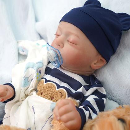 Imagem de Boneco Bebê Reborn Menino Realista Silicone Conjunto de Roupa Chupeta Mamadeira e Pelúcia Original Completo
