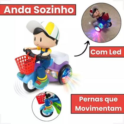 Imagem de Brinquedo Boneco Boneca Triciclo Que Anda, Led, Som, Gira E