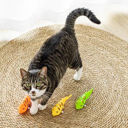 Imagem de Brinquedo de plástico Wind Up Wiggle Fish para cães e gatos (3 unidades)