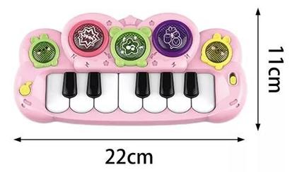 Imagem de Brinquedo Teclado Infantil Rosa Com 12 Teclas Interativa Com Som e Luz