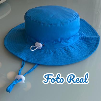 Imagem de Cadeira de Praia Infantil Dinossauro com Guarda-Sol e Chapéu Azul com fator de proteção UV - RIKABUNI