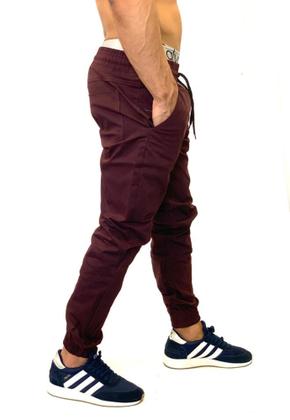 Imagem de CALÇA jeans MASCULINA JOGGER EM SARJA E JEANS SLIM ESTILO DESTROYED CALÇA COM ELASTICO